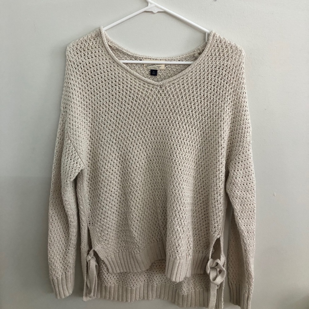 tan sweater
